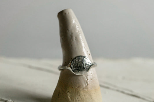 Fingerprint freeform ring