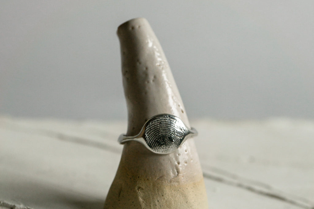 Fingerprint freeform ring