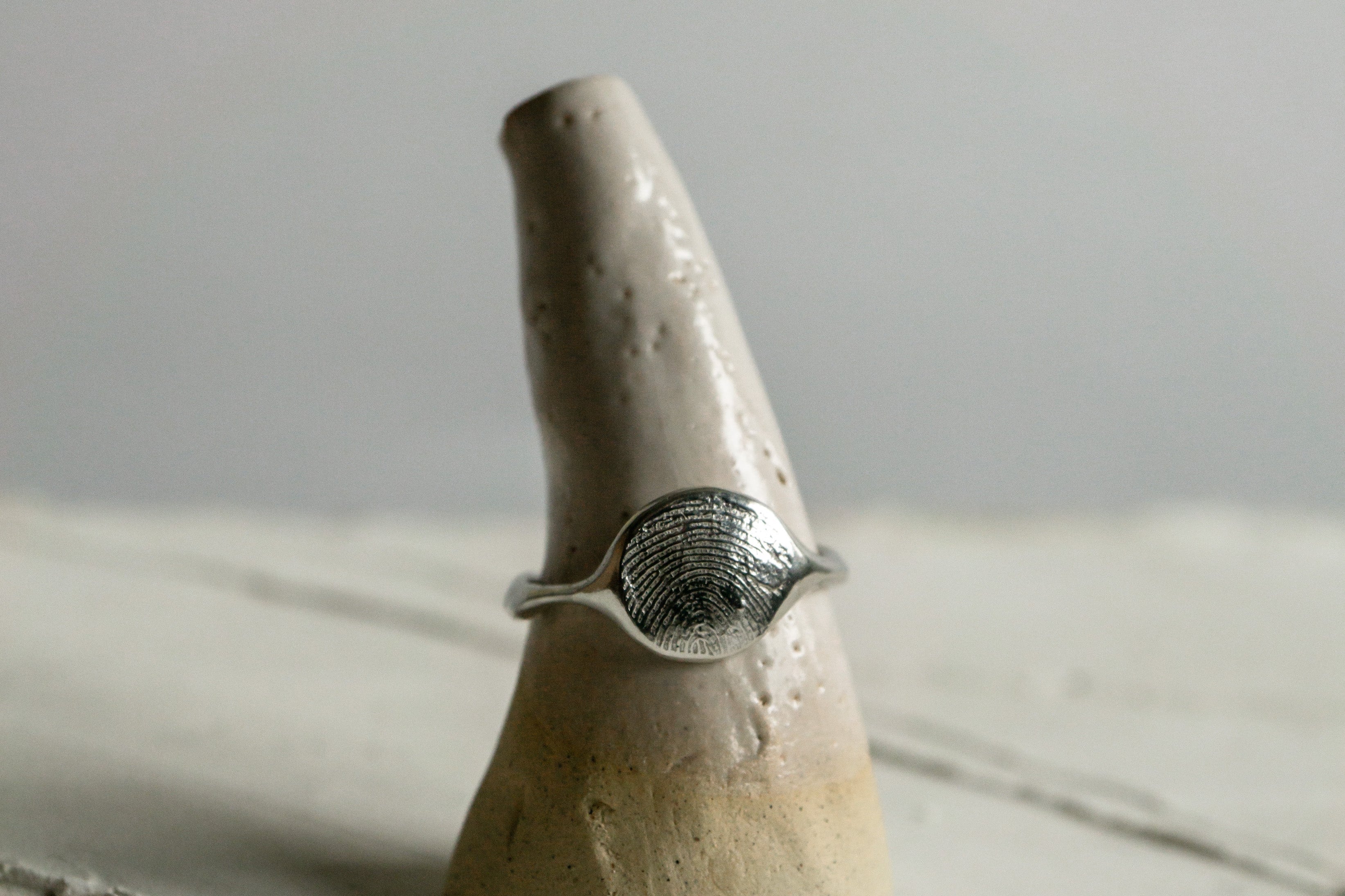 Fingerprint freeform ring