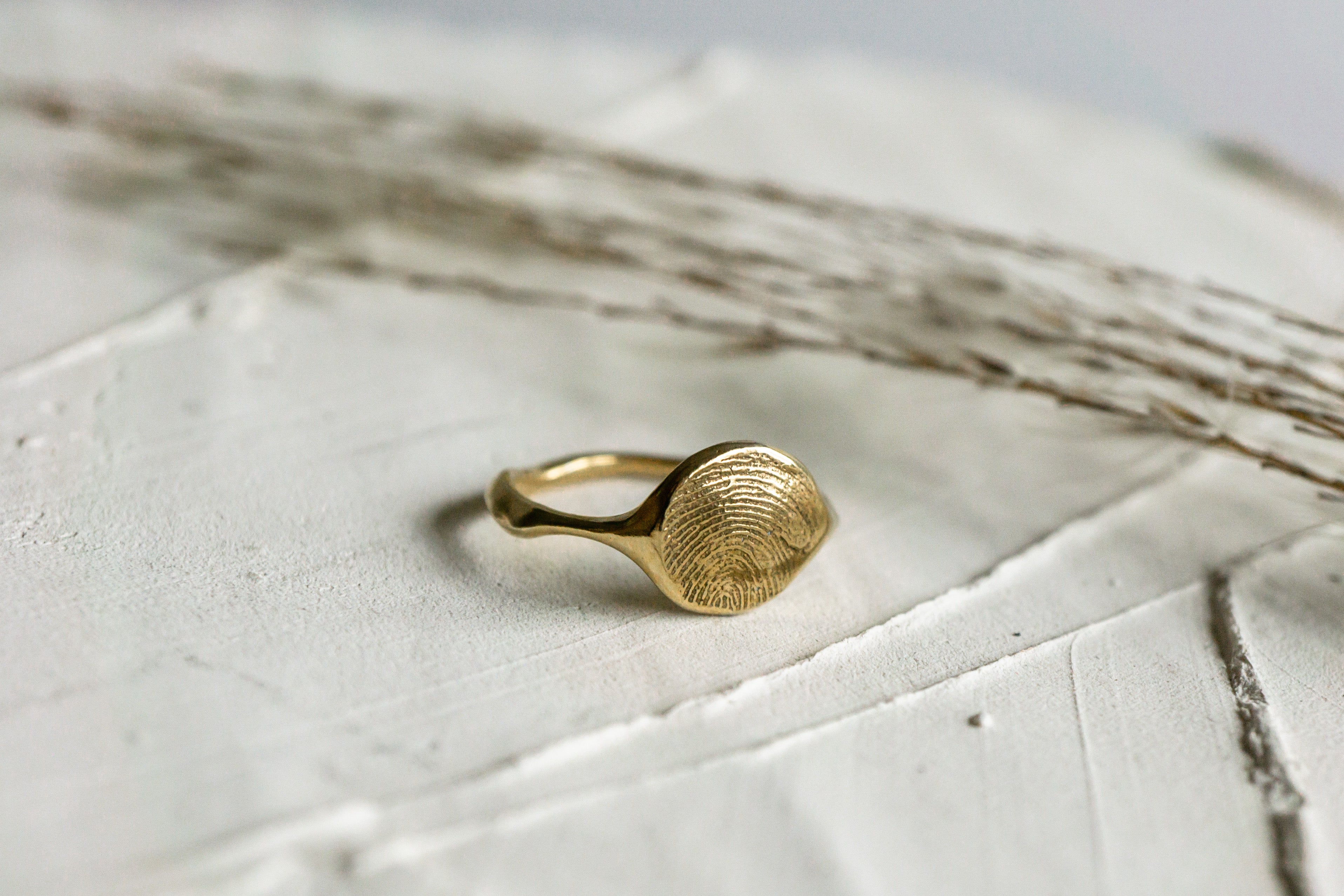 Fingerprint freeform ring