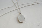 Fingerprint necklace from an ink imprint